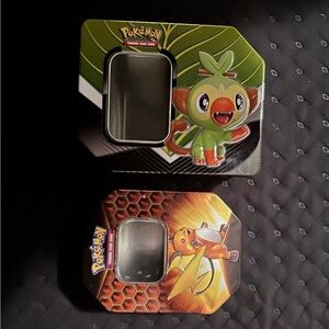 Pokemon Grookey and Raichu Card Tins - Green and Orange